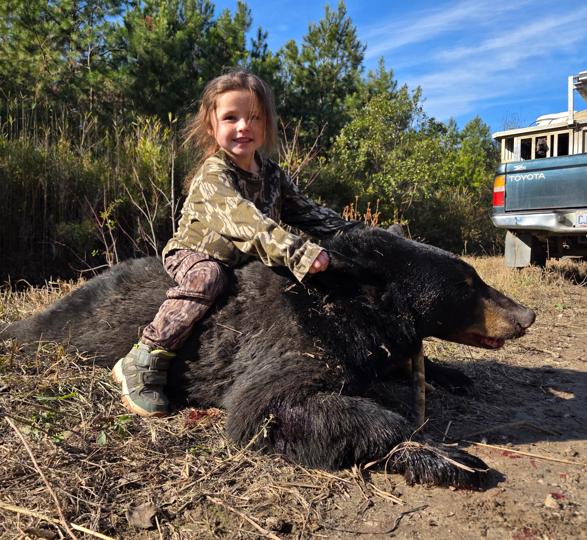 Local kid, cancer patient claims big bear on North Carolina hunt